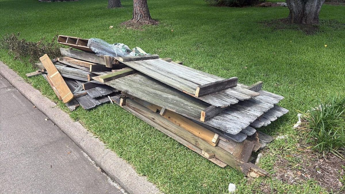Old lumber and wood debris cleared from a property