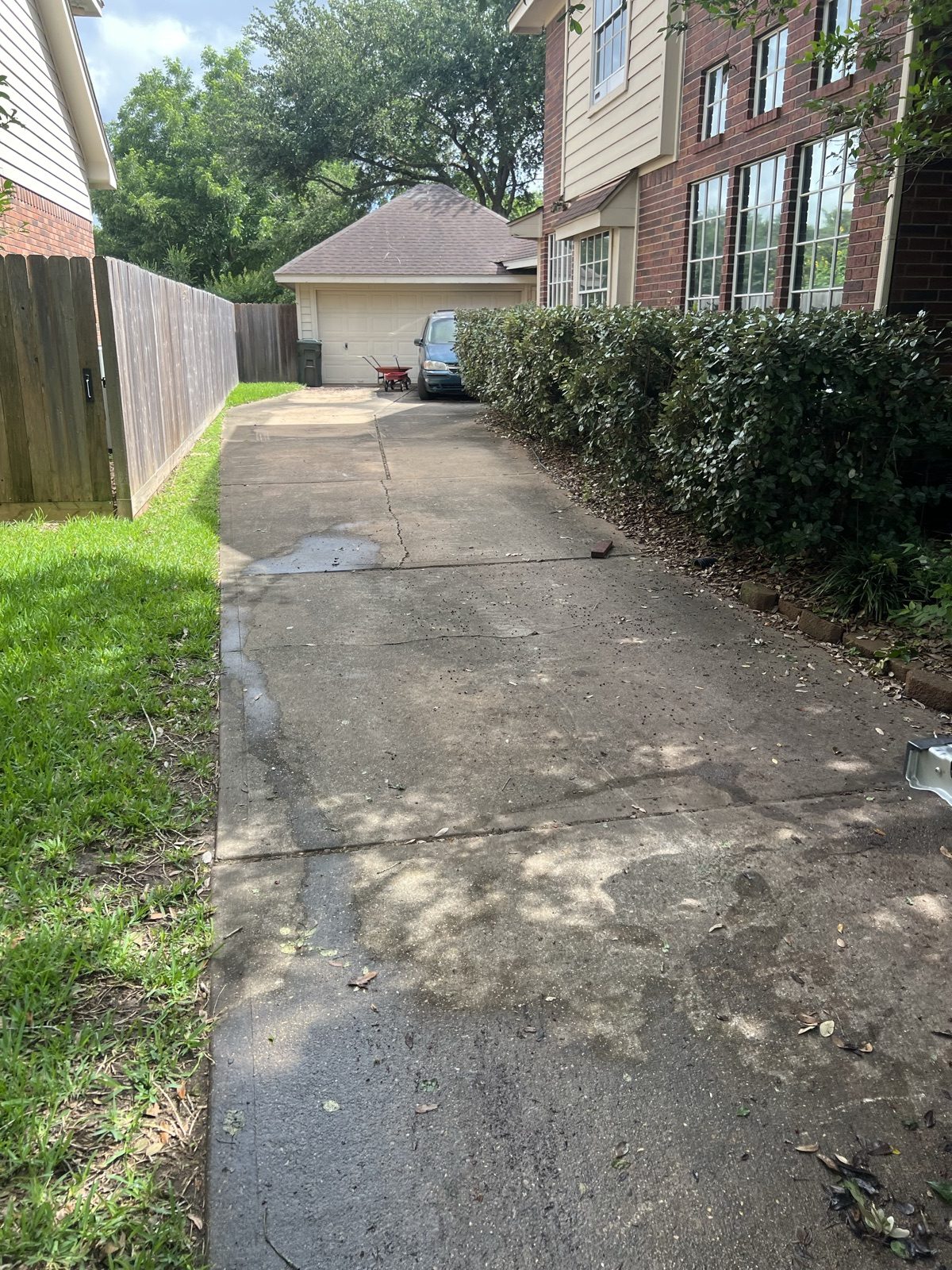 Cleared and swept driveway after a junk removal job