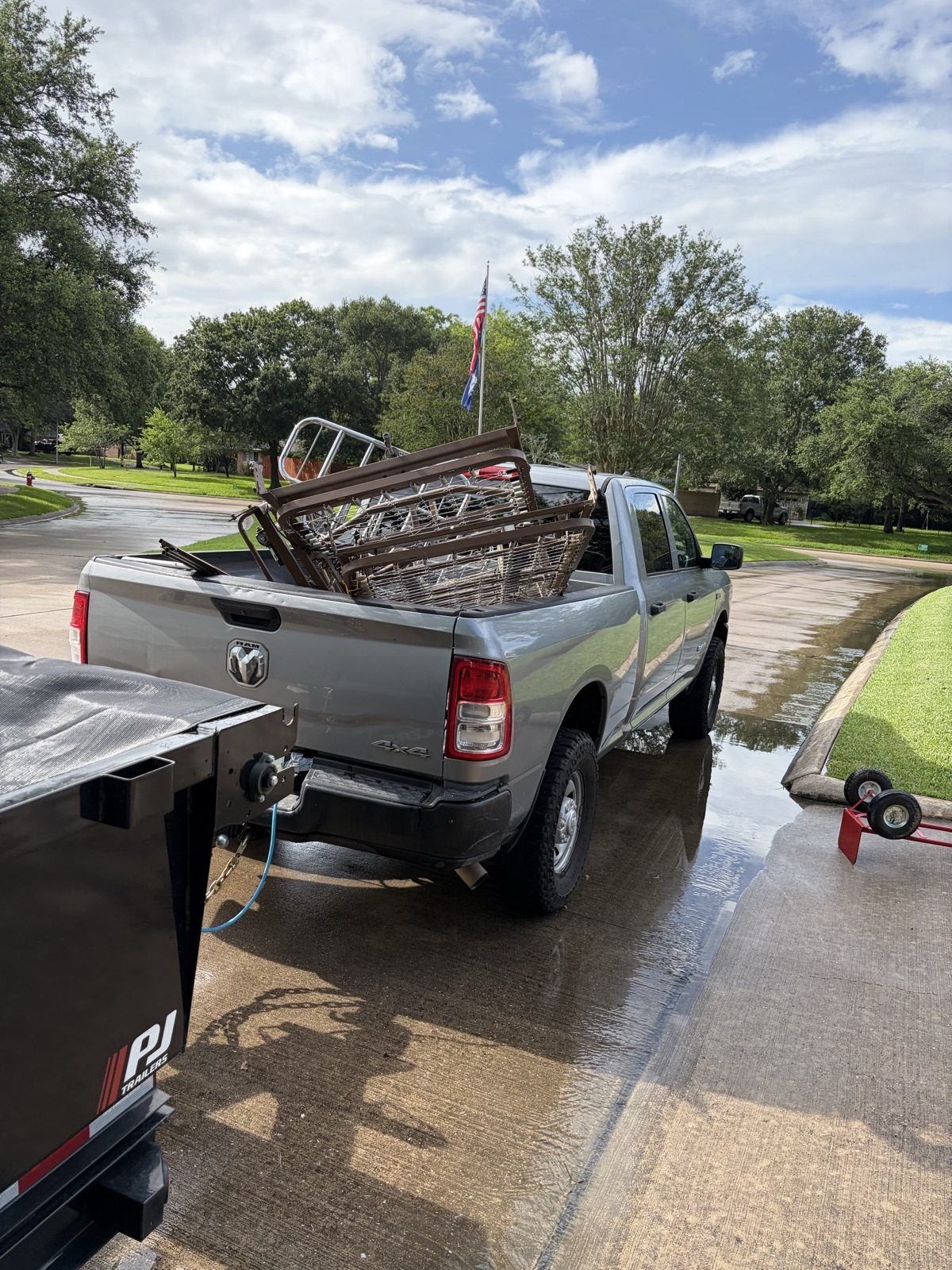 H&L truck and trailer hauling debris
